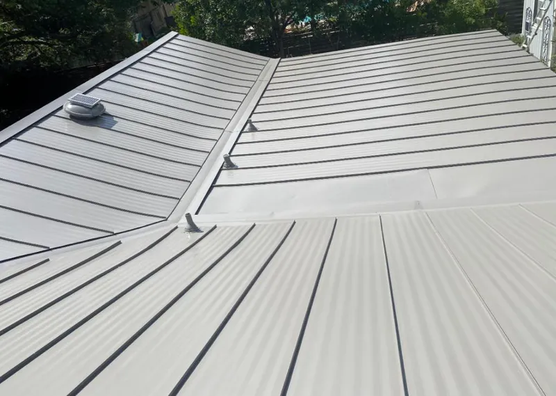 Solar attic fan installed on a metal roof for Roof Ventilation in Citrus Heights
